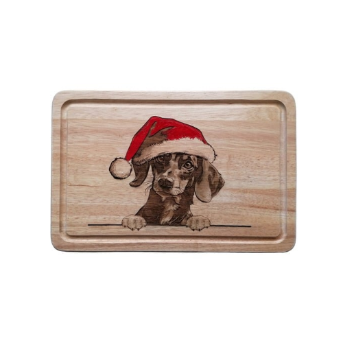 Chopping board with Dachshund in red Santa hat design laser engraved on it photo