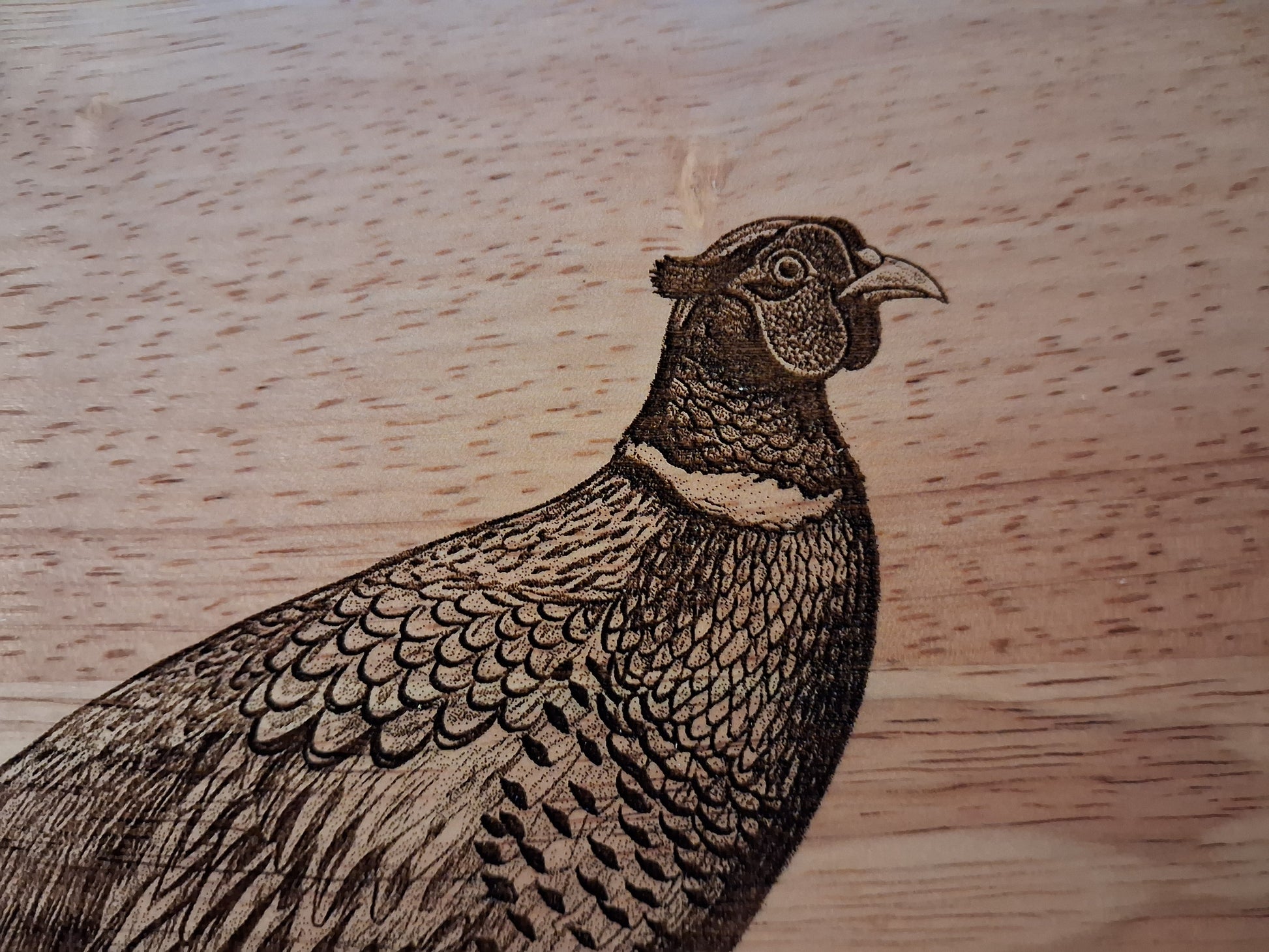 Pheasant Design Medium Chopping Board With Handle Close-up 